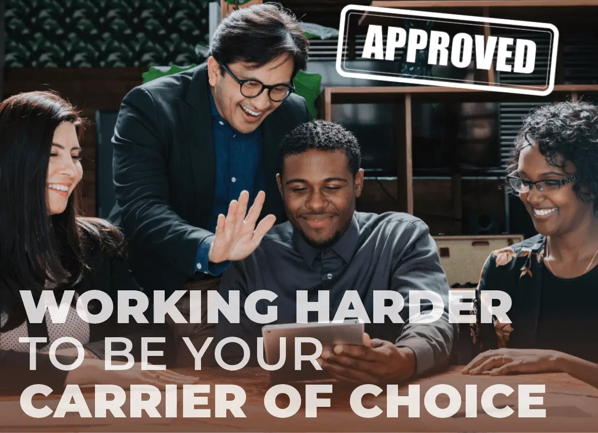 People in an office smiling