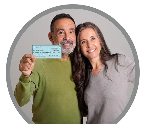 Retirees holding retirement check