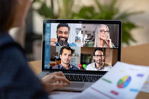 People in an office smiling